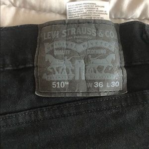 Levi’s 510 ripped knee jeans